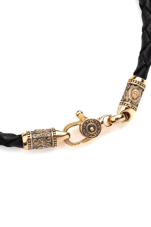 Браслет из золота c кожаным шнурком и ониксом
