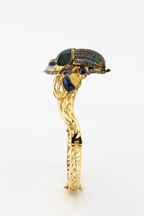 Браслет из лимонного золота c эмаль , фианитом, турмалином и эмалью