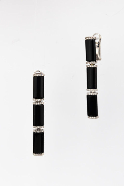 Серьги из белого золота c бриллиантами и ониксом